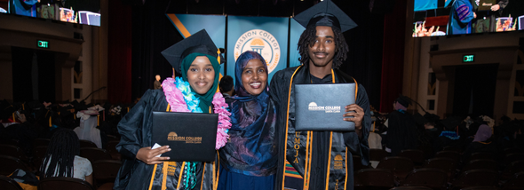 Students smiling at graduation