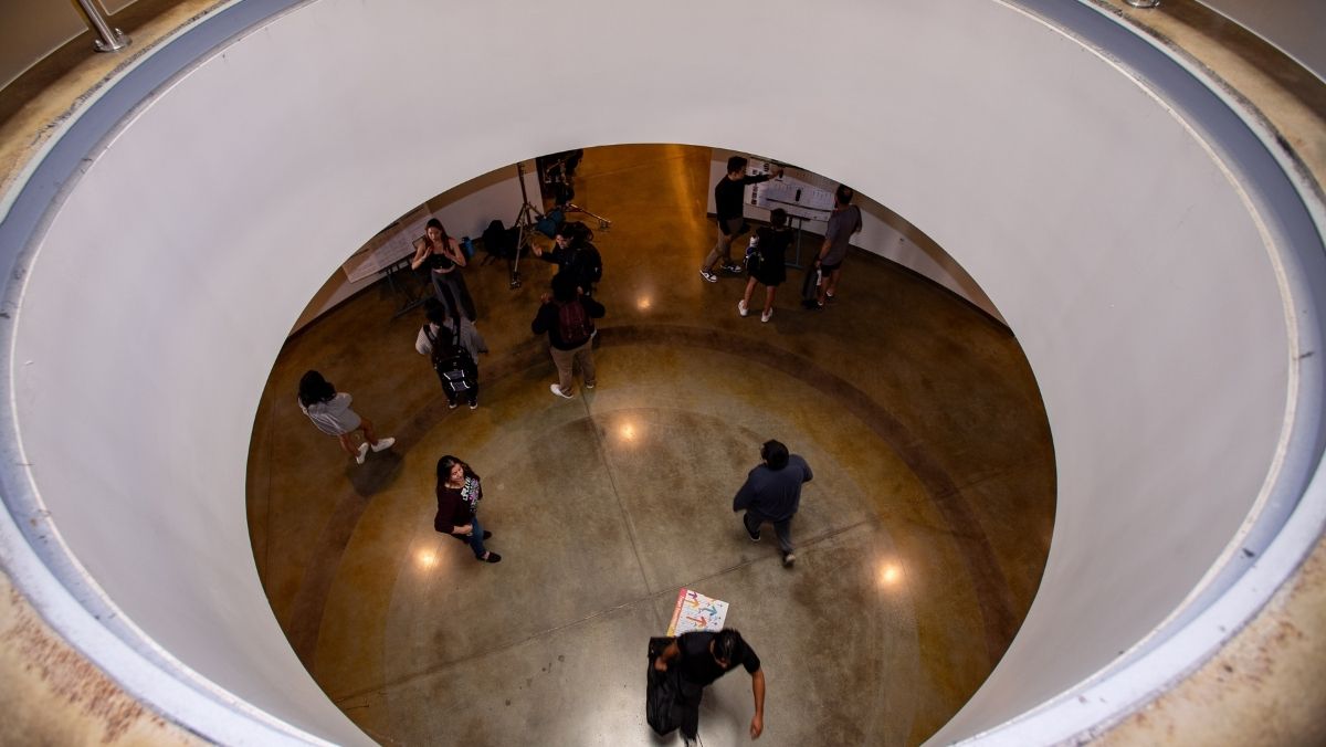 Mission College students talking during project