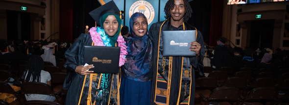 Students and friend smiling