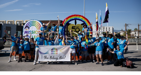 Group holding pride flag