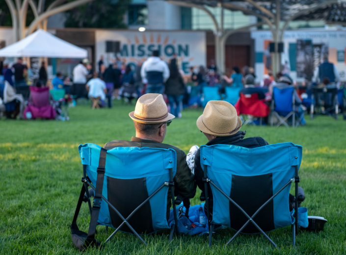 People enjoying concert